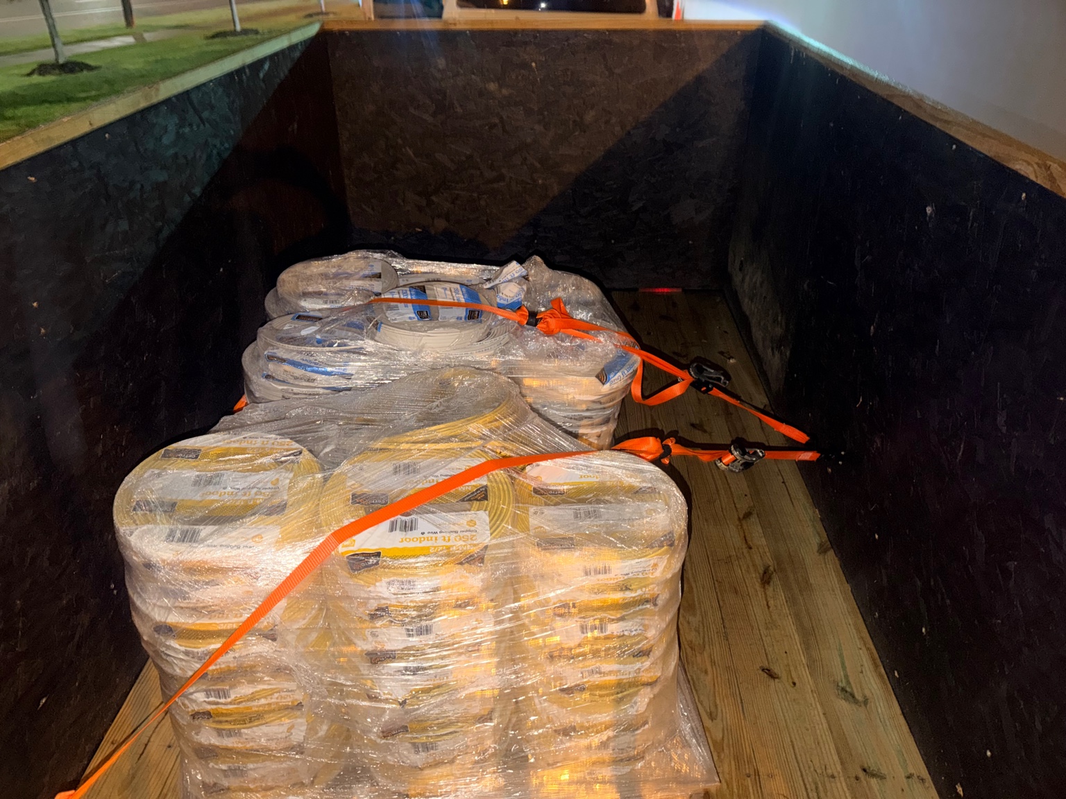 Pallets and wire secured for hauling